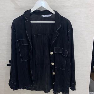 Zara’s shirt